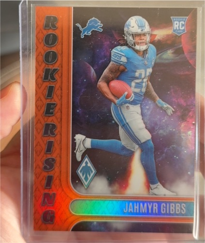 2023 Panini Phoenix Rookie Rising #RIS-8 Jahmyr Gibbs — front