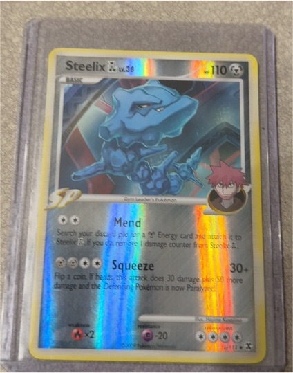 2009 Pokémon Rising Rivals #51 Steelix — front
