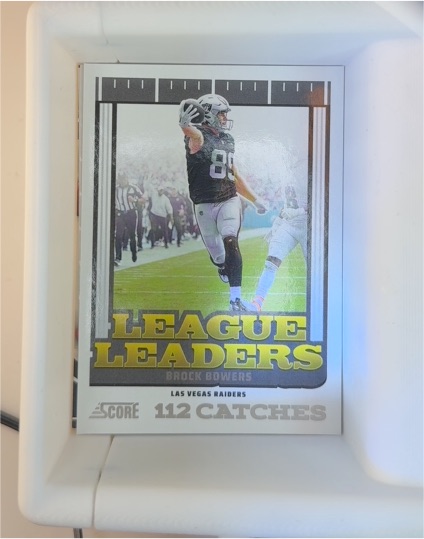 2025 Panini Score League Leaders #12 Brock Bowers — front