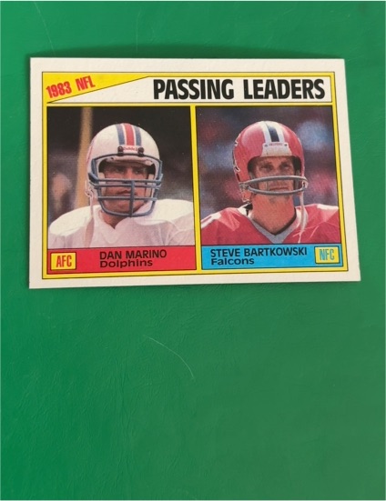 1984 Topps #202 1983 Passing Leaders Dan Marino / Steve Bartkowski — front