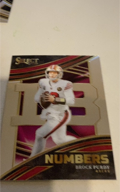 2023 Panini Select #NMB-BPU Brock Purdy Select Numbers — front