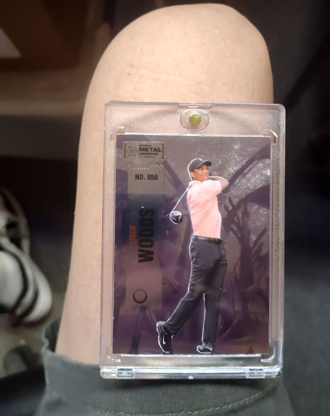 2022 Skybox Metal Universe Champions #050 Tiger Woods — front