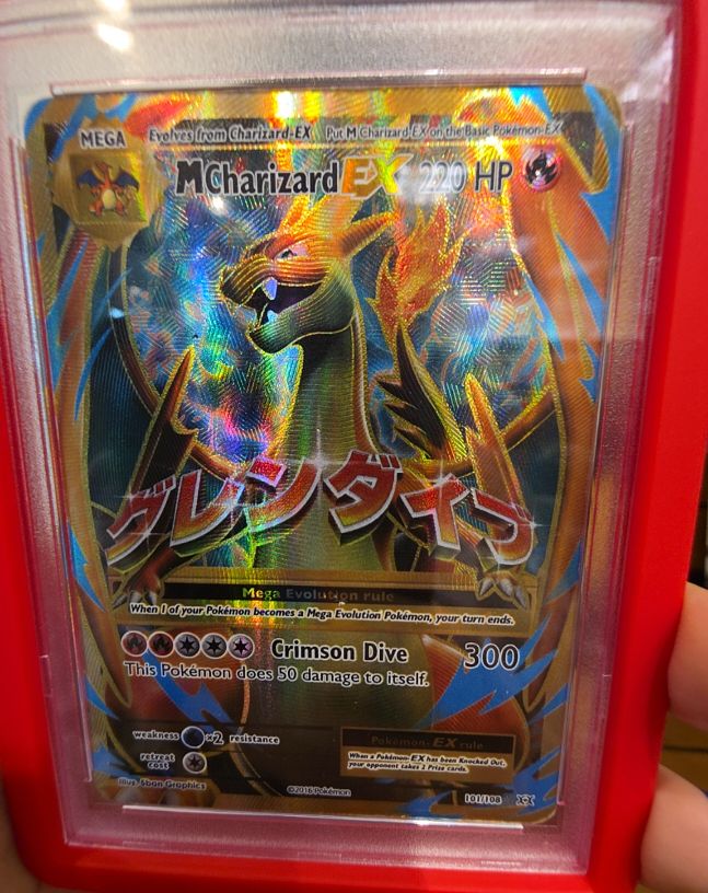 2016 Pokémon XY Evolutions #101 M Charizard EX — front