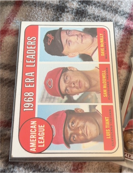 1969 Topps #7 American League 1968 ERA Leaders Luis Tiant, Sam McDowell, Dave McNally — front