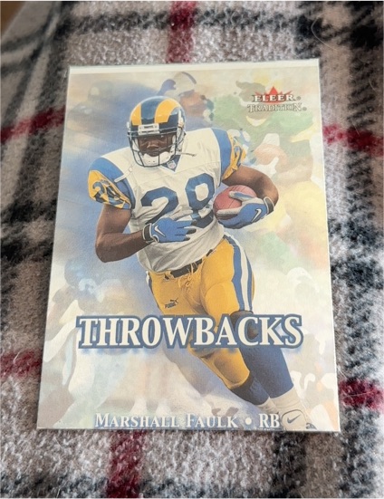 2000 Fleer Tradition #9 Marshall Faulk Throwbacks — front