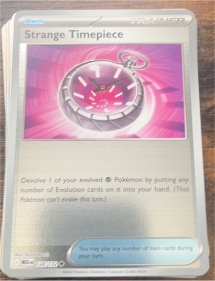 2025 Pokémon Mega Evolution #128 Strange Timepiece — front