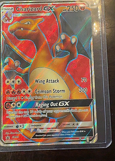 2017 Pokémon TCG Charizard GX #SM60 — front