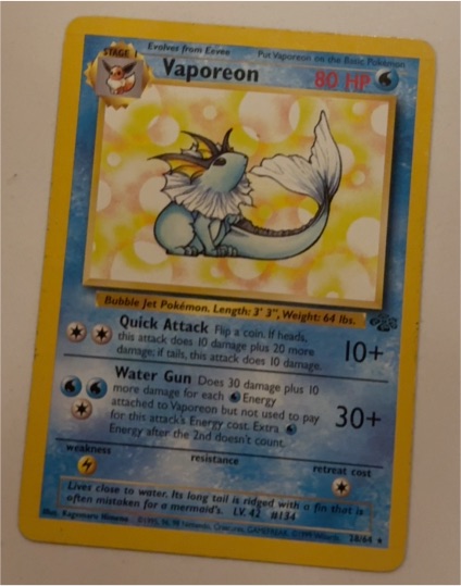 1999 Pokémon Jungle #28 Vaporeon — front