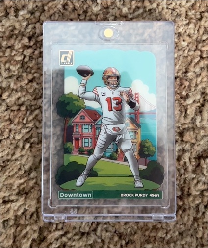 2024 Panini Donruss - Downtown! #4 Brock Purdy — front