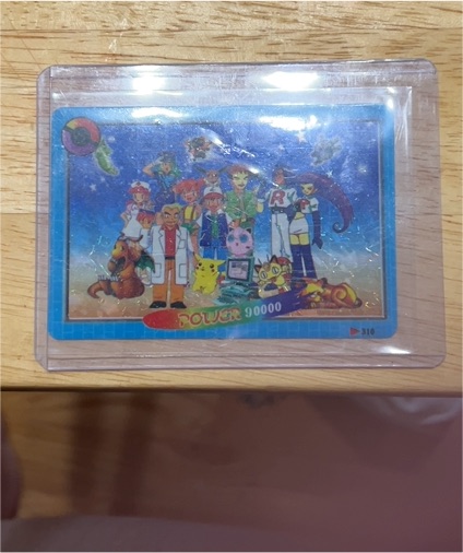 1990 Pokémon #310 Ash Ketchum and Team — front
