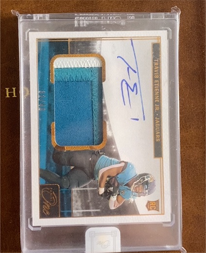 2021 Panini One #14 Travis Etienne Jr. — front