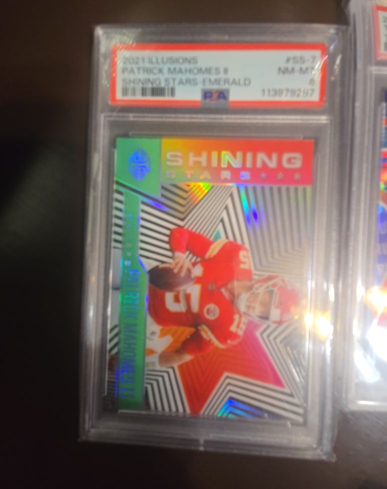 2021 Panini Illusions #SS-7 Patrick Mahomes II Shining Stars Emerald — front