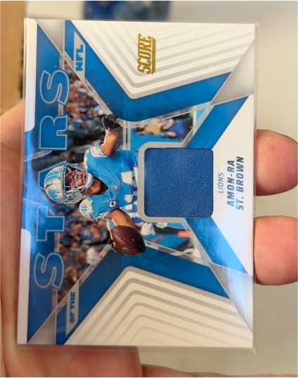2025 Panini Score #SNJ-ASN Amon-Ra St. Brown — front