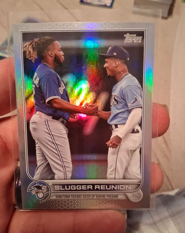 2022 Topps Series 1 #329 Slugger Reunion Wander Franco & Vladimir Guerrero Jr. — front