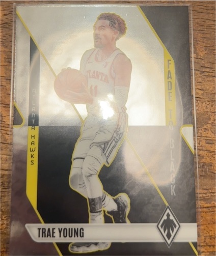 2023-24 Panini Phoenix #16 Trae Young — front