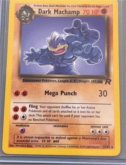1999 Pokémon Team Rocket #27 Dark Machamp — front