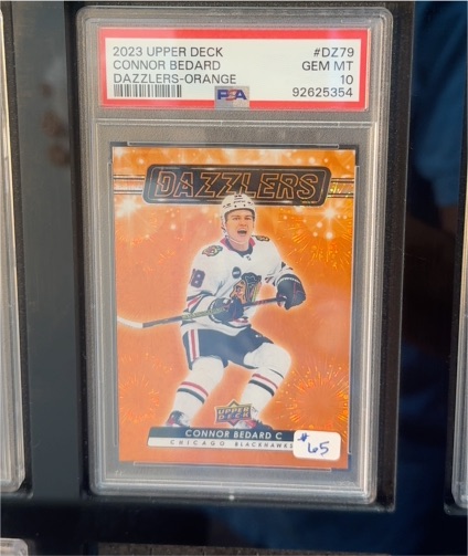 2023 Upper Deck #DZ79 Connor Bedard Dazzlers Orange — front