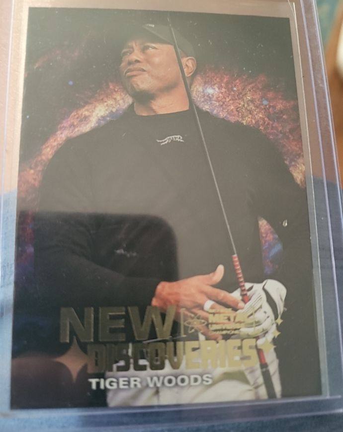 2024 Skybox Metal Universe Champions #ND-2 Tiger Woods New Discoveries — front