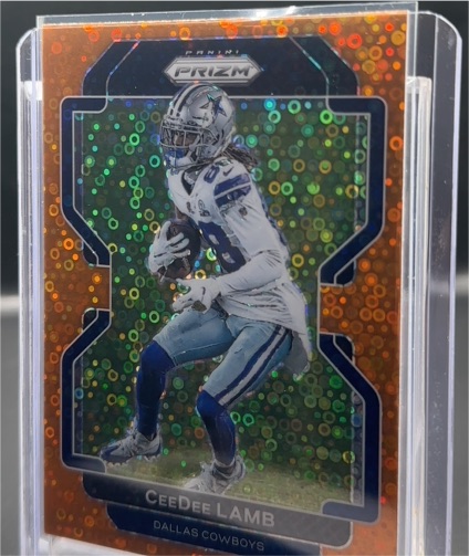 2021 Panini Prizm Orange Disco #X CeeDee Lamb — front