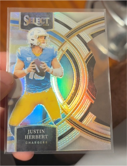 2023 Panini Select Premier Level #136 Justin Herbert — front