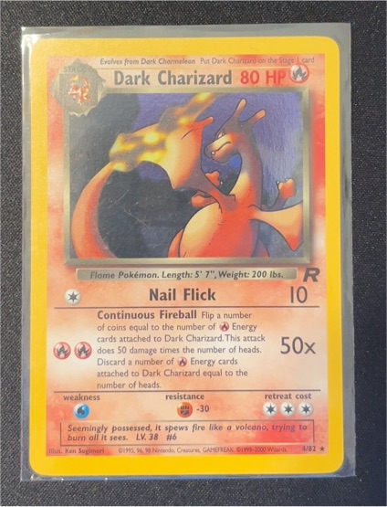 1999 Pokémon Team Rocket #4 Dark Charizard — front