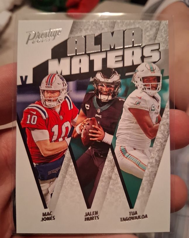 2023 Panini Prestige Alma Maters #AM-3 Jalen Hurts, Mac Jones, Tua Tagovailoa — front