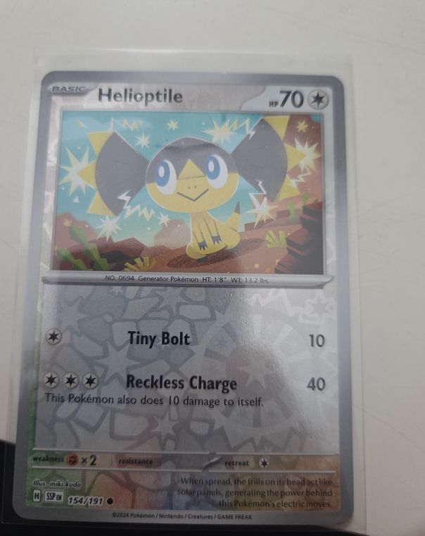 2024 Pokémon SV08 Surging Sparks #154 Helioptile — front