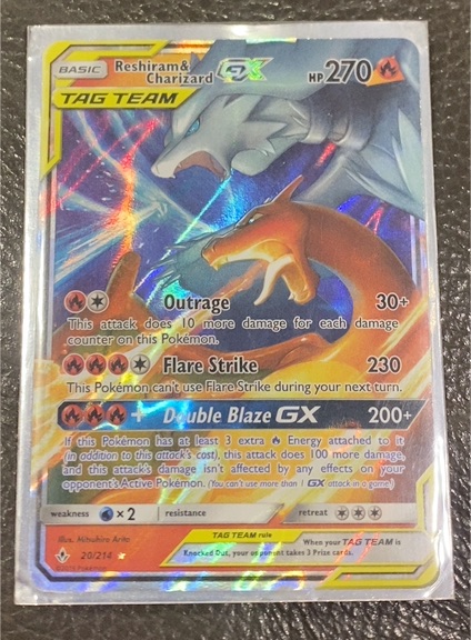 2019 Pokémon SM Unbroken Bonds #20/214 Reshiram & Charizard GX — front