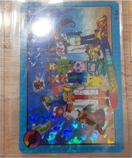 1999 Pokemon Vending Sticker #310 Team Rocket Holo — front