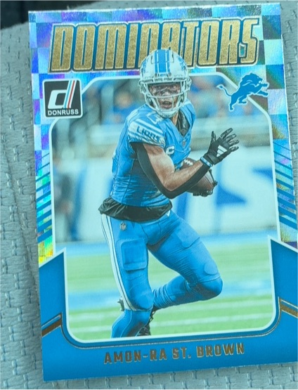 2024 Panini Donruss #28 Amon-Ra St. Brown Dominators — front