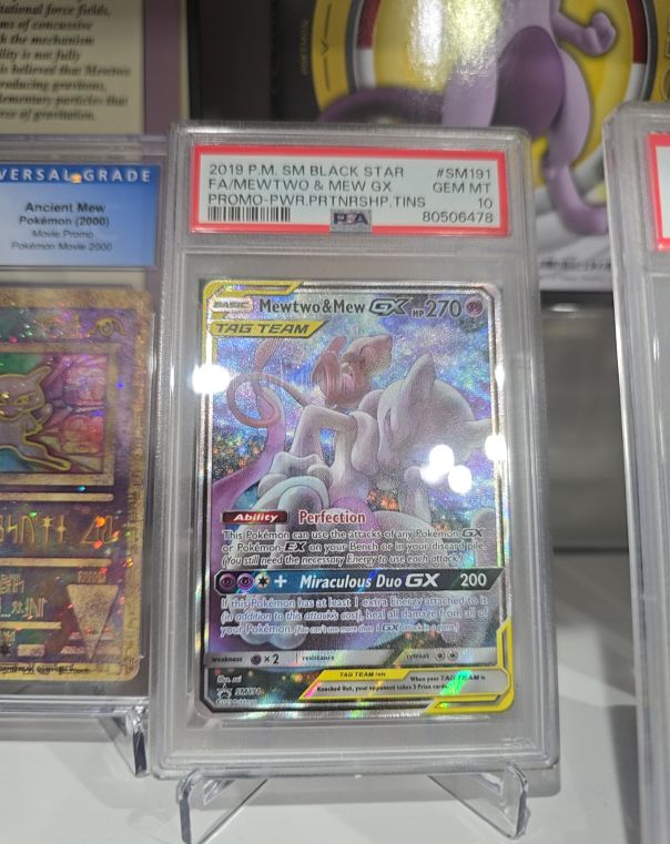 2019 P.M. SM BLACK STAR #SM191 Mewtwo & Mew GX — front