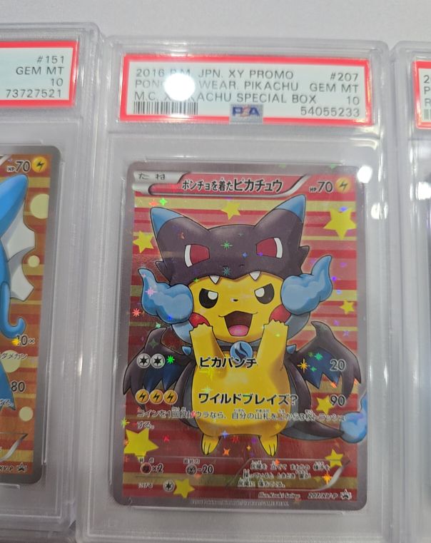 2016 Pokémon JPN XY Promo #207 Poncho-Wearing Pikachu — front