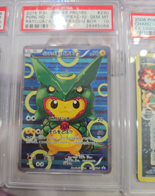 2016 Pokémon XY Promo #230 Poncho-Wearing Pikachu Rayquaza — front