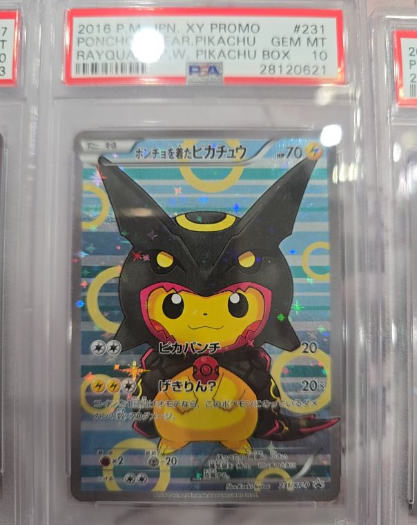 2016 Pokemon XY Promo #231 Poncho-Wearing Pikachu Rayquaza — front