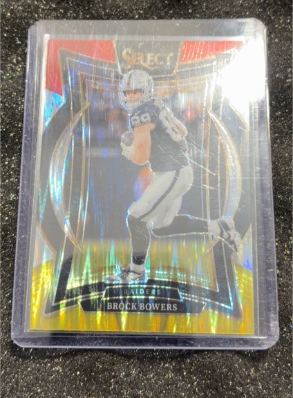 2024 Panini Select - Concourse Brock Bowers #31 Black & Orange Shock Prizm (RC) — front