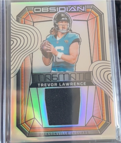 2024 Panini Obsidian #MM-TLE Trevor Lawrence — front