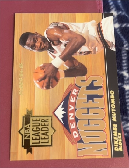 1994-95 Fleer #4 Dikembe Mutombo NBA League Leaders — front