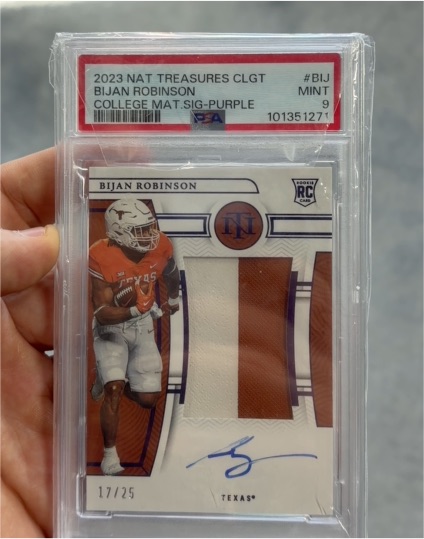 2023 Panini National Treasures Collegiate #BIJ Bijan Robinson College Material Signature Purple — front