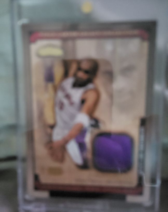 2002-03 Fleer Showcase Vince Carter Legacy Collection Game-Worn MEM Relic Card — front