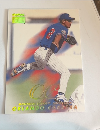 2000 SkyBox Premium #PC Orlando Cabrera — front