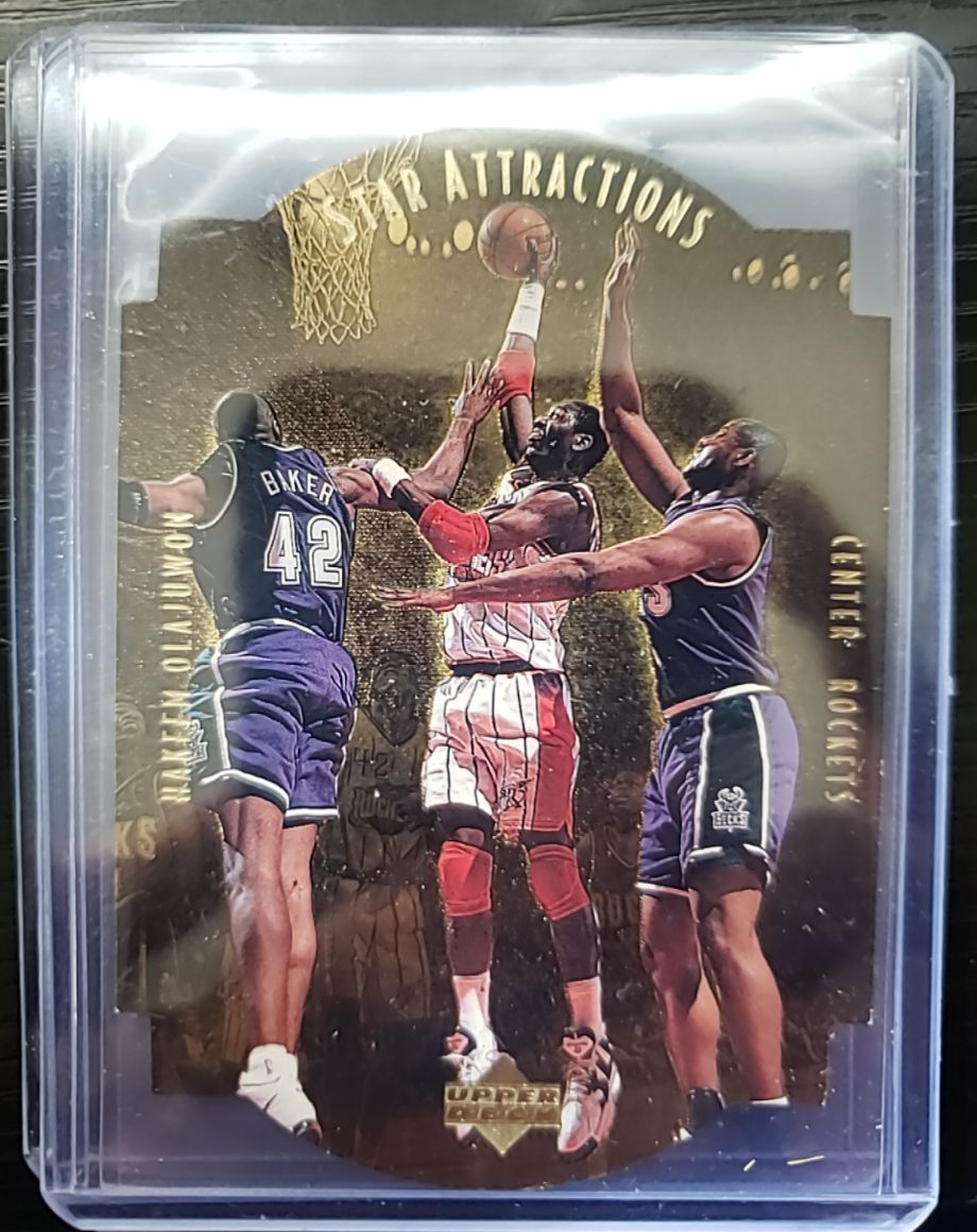 1997-98 Upper Deck Collector's Choice Star Attractions #SA15 Hakeem Olajuwon — front