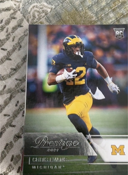 2021 Panini Chronicles Draft Picks Prestige #77 Chris Evans Rookie Card Michigan Wolverines — front