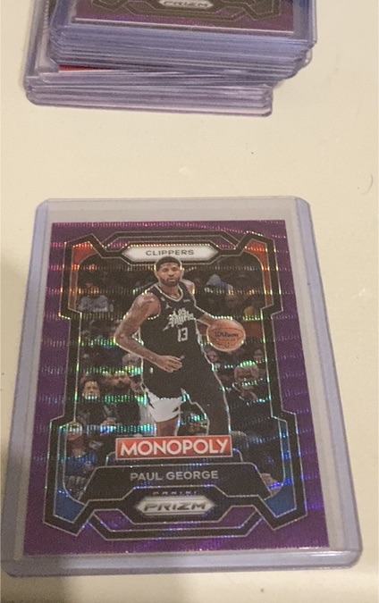 2023-24 Panini Prizm Monopoly Purple Wave Prizm #13 Paul George — front