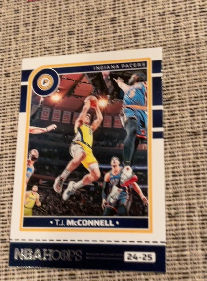 2024-25 Panini NBA Hoops #49 T.J. McConnell — front