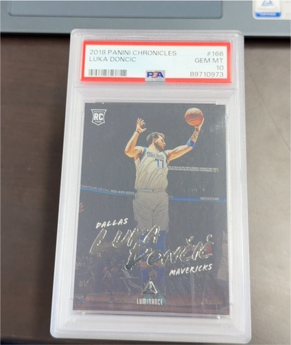 2018 Panini Chronicles Luminance #166 Luka Doncic Rookie Card — front