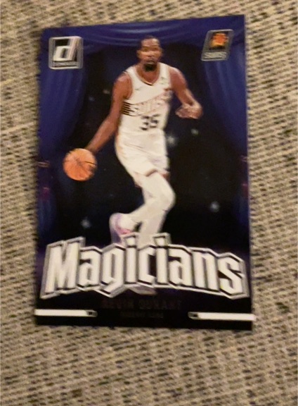 2024-25 Panini Donruss - Magicians #8 Luka Dončić — front