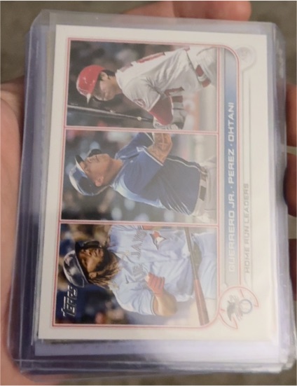 2022 Topps Series 1 #48 AL Home Run Leaders Shohei Ohtani, Vladimir Guerrero Jr., Salvador Perez — front