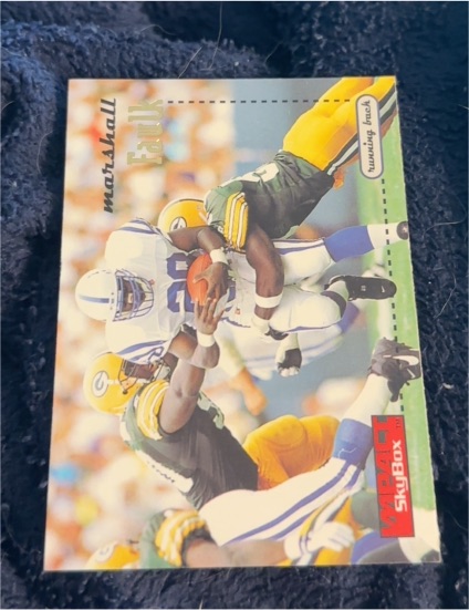 1996 SkyBox Impact #61 Marshall Faulk — front