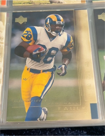 2000 Upper Deck Gold Reserve #134 Marshall Faulk — front
