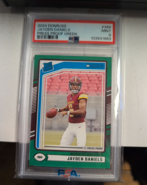 2024 Panini Donruss #389 Jayden Daniels Press Proof Green Rookie — front